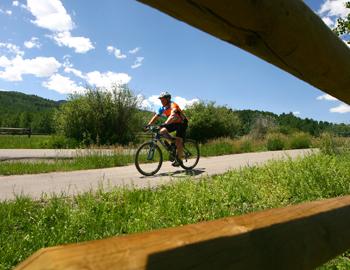 Road biker on a trail near Aspen