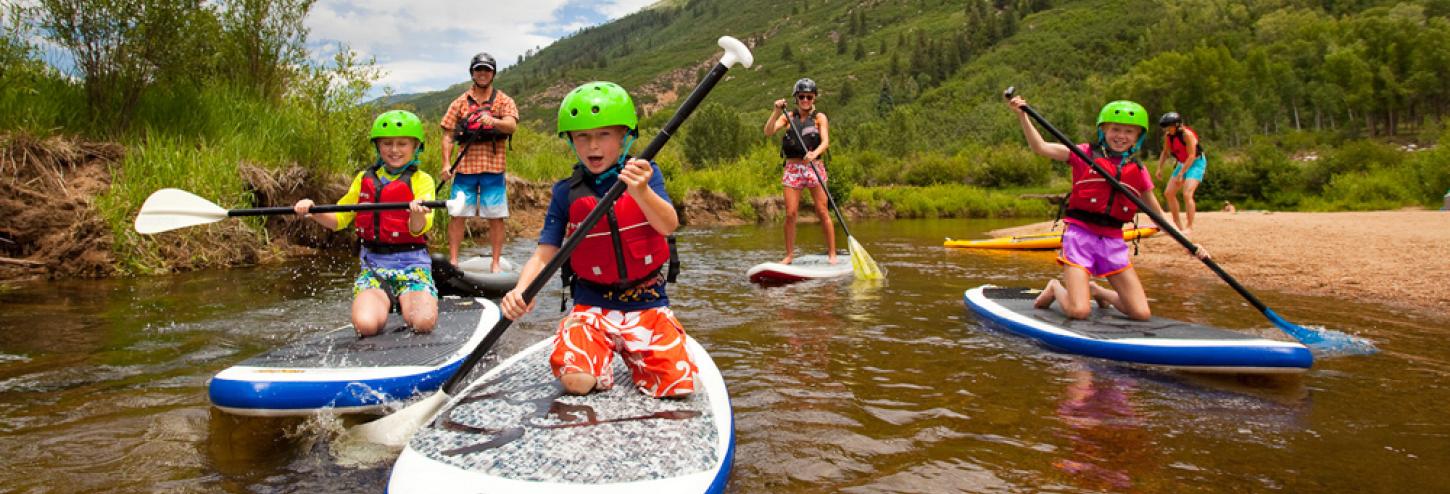 Kids on standup paddleboards