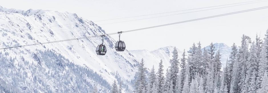Aspen Snowfall on gondola and mountains