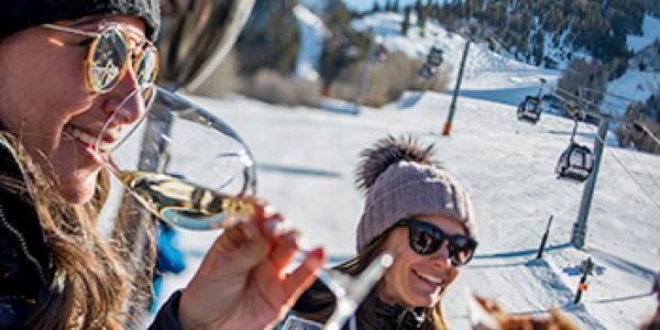 A couple at Apres Ski outside in Aspen