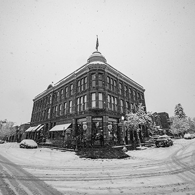 black and white old photo of downtown aspen