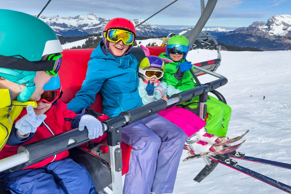 family skiing in aspen